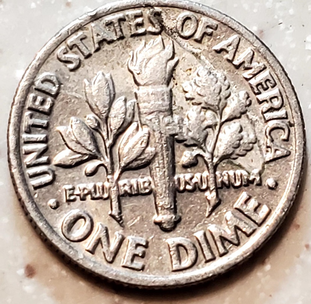 2009-P Roosevelt dime lamination crack error on obverse showing planchet delamination